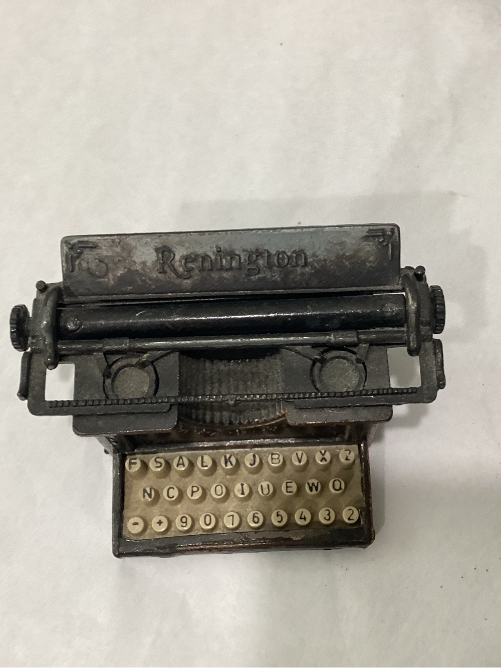 Vintage Renington typewriter pencil sharpener styled after early 1900s classic